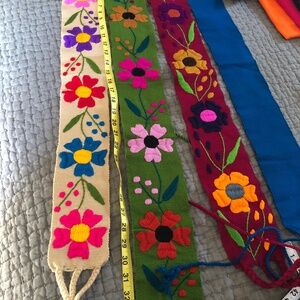 Hand embroidered belts